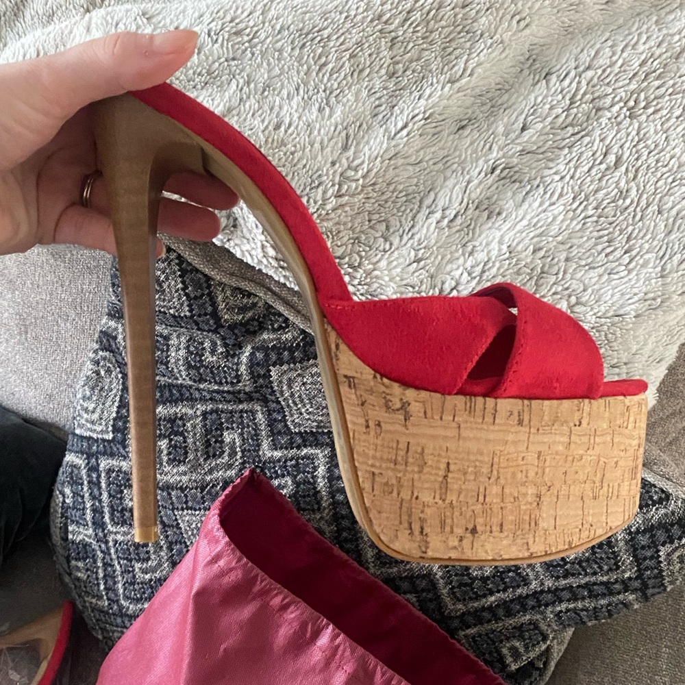 Size 44, super high heels, never worn, $145 new